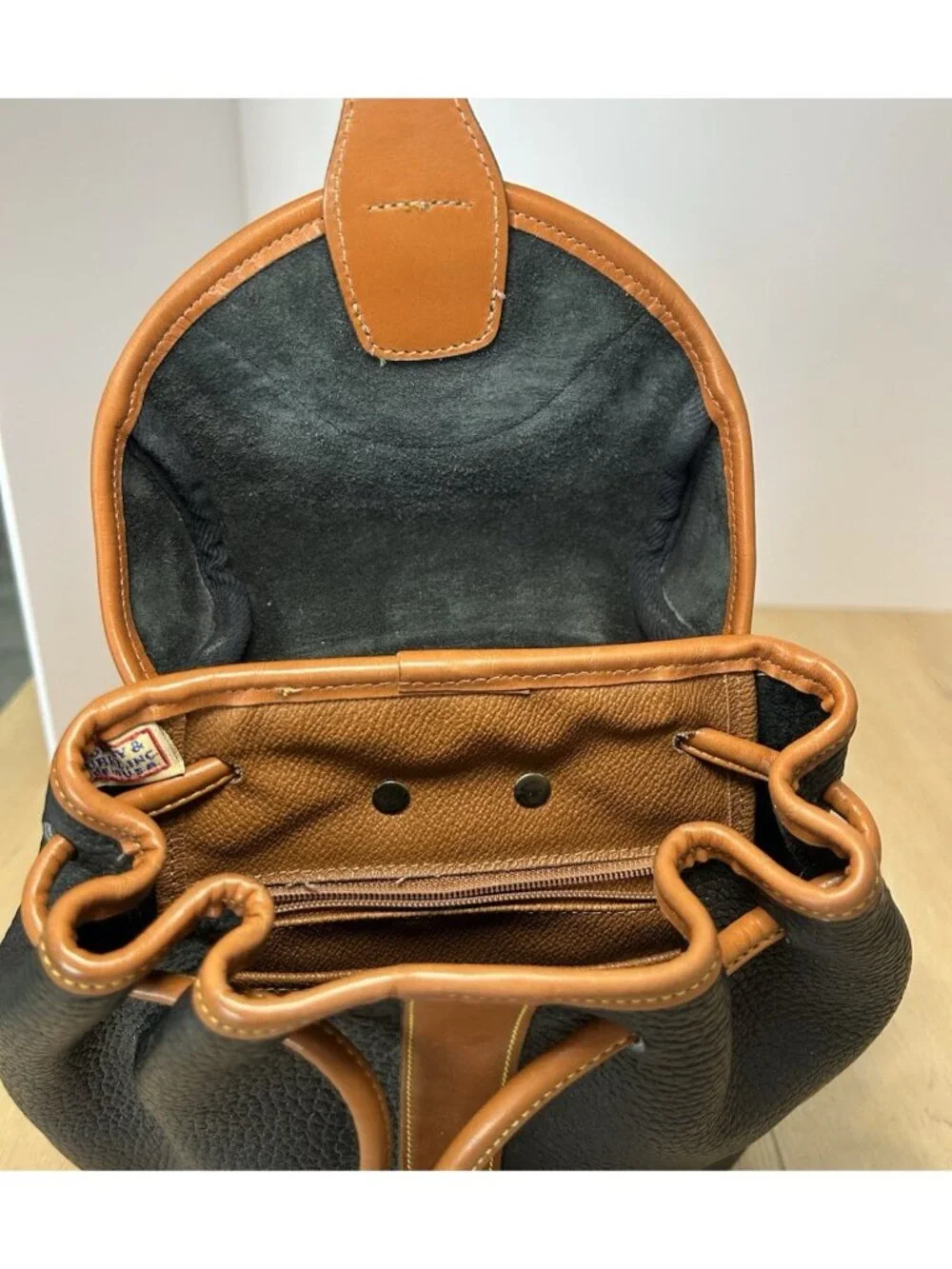Vintage Dooney & Bourke Black Tan Color All Weather Leather Backpack